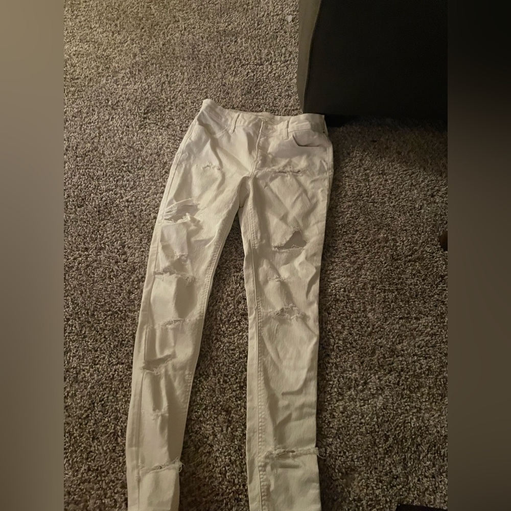 White jeans with holes